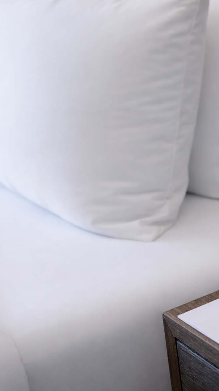 Closeup of a notepad on a night stand