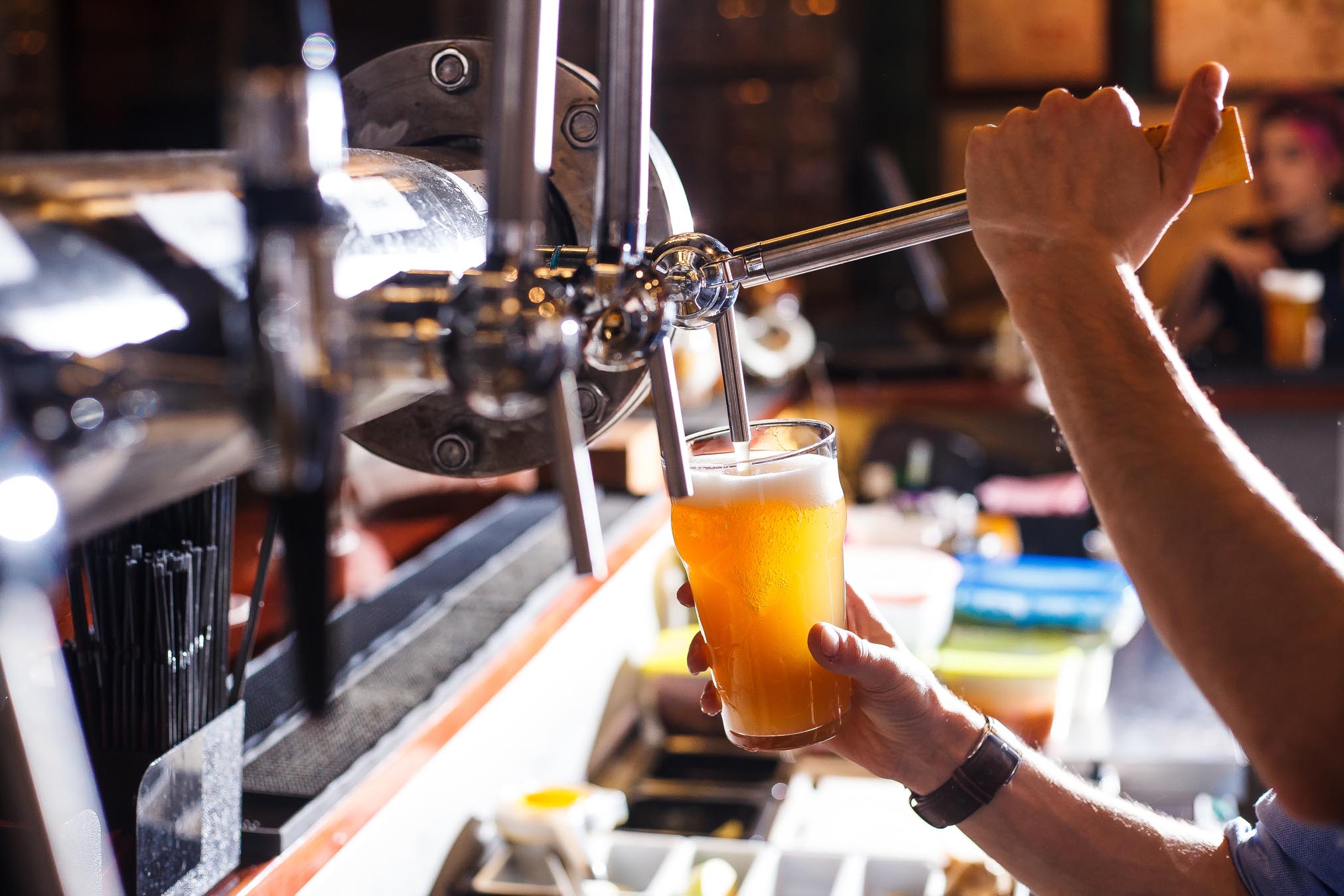 Bartender pouring beer