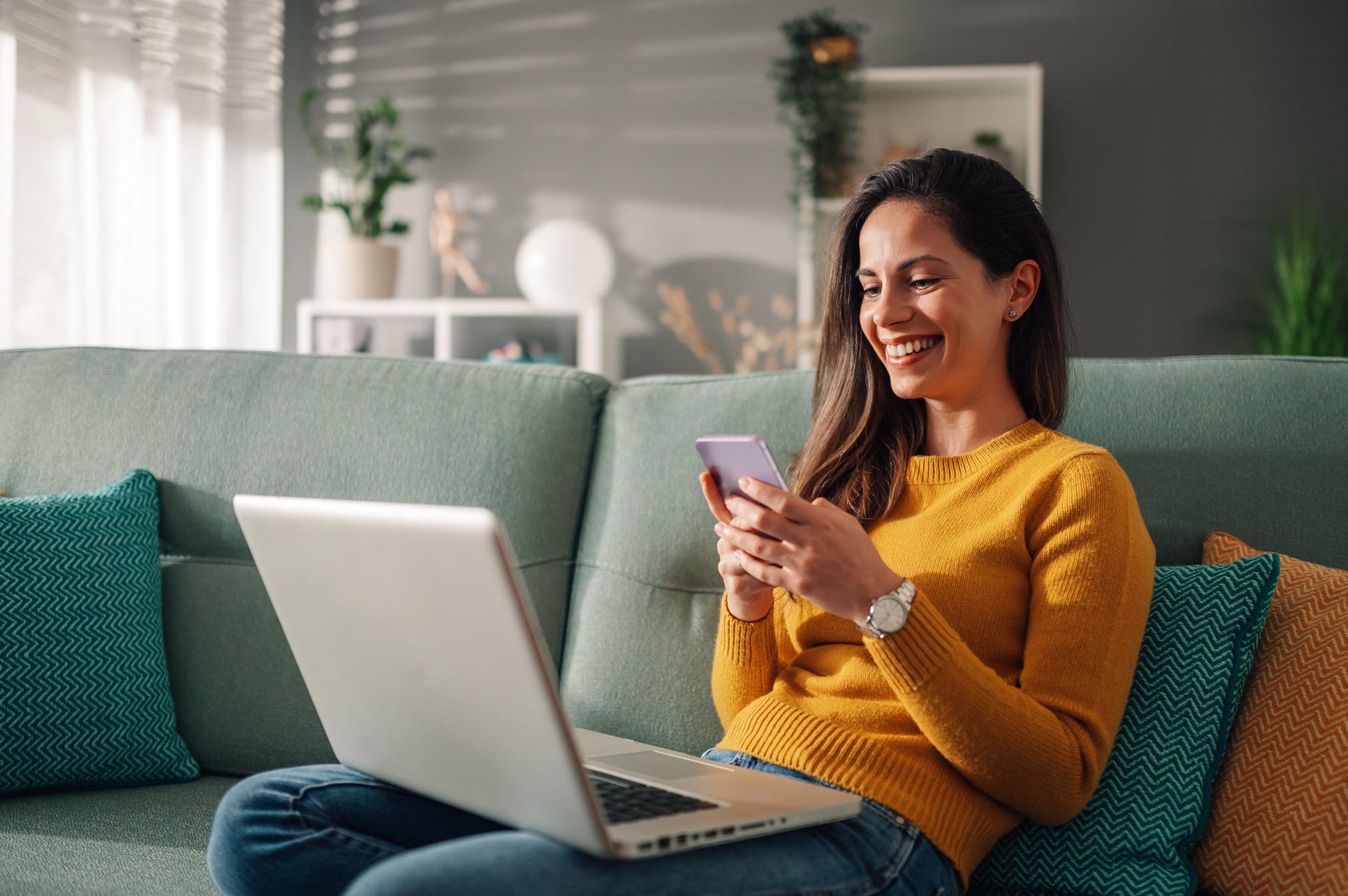 Man and woman looking at laptop